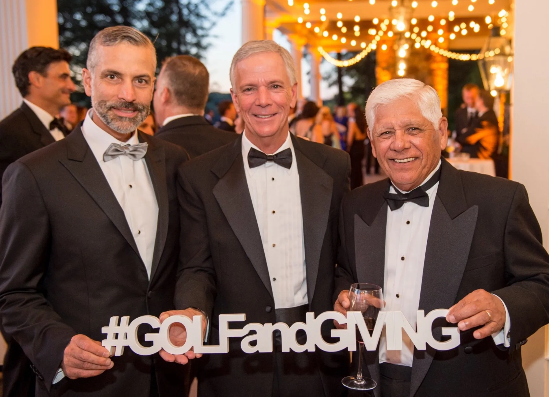 Guests at a #GOLFandGIVING gala evening